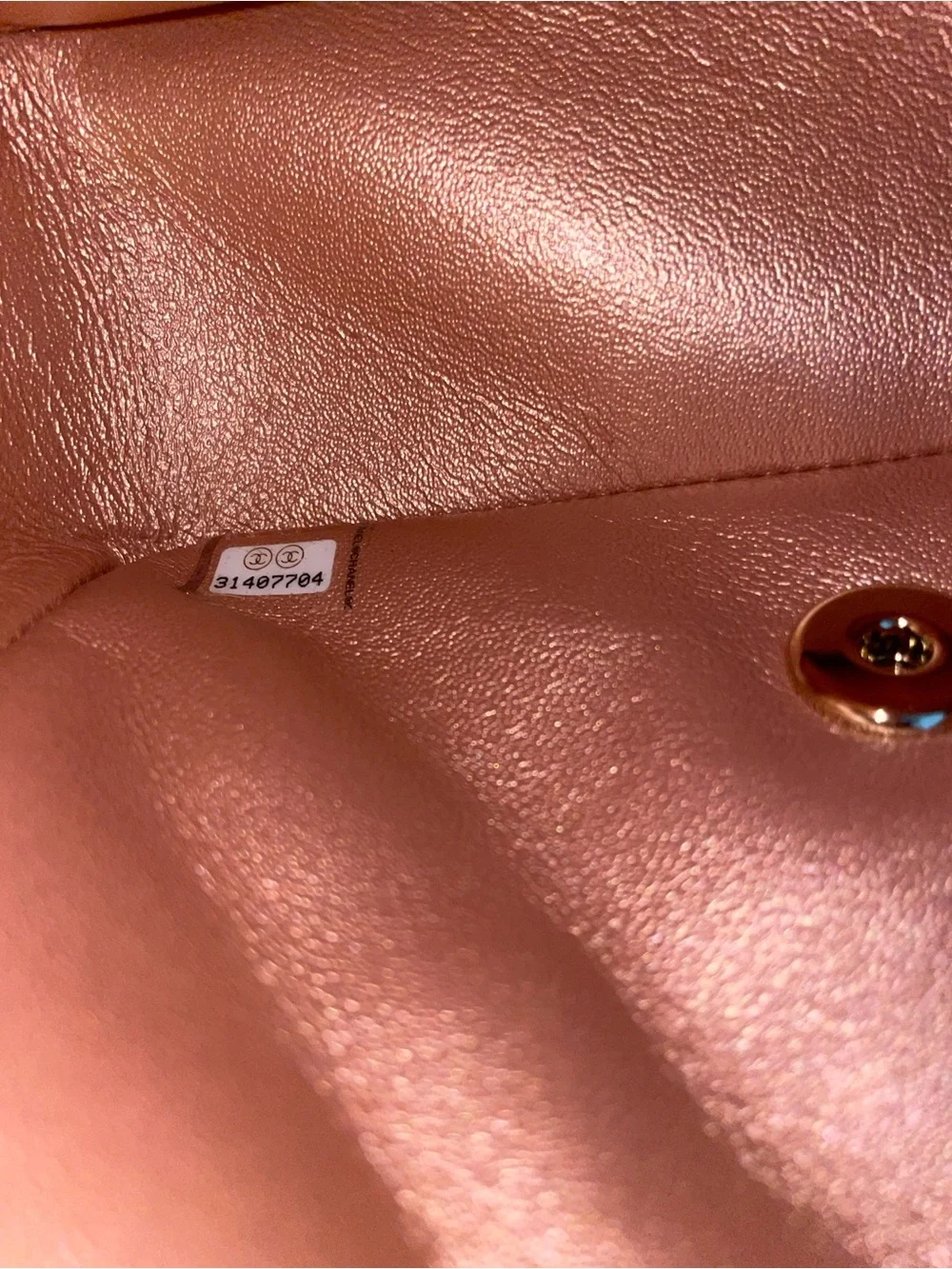 CHANEL Quilted Mini Flap Bag in Metallic Rose